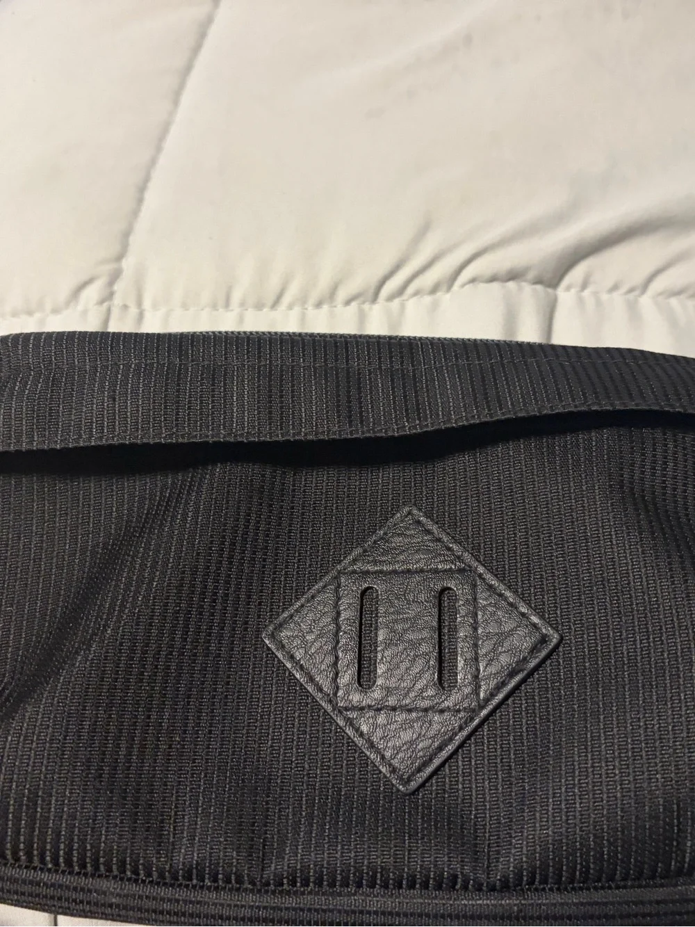 Black unisex Messenger Bag with Lash Tab